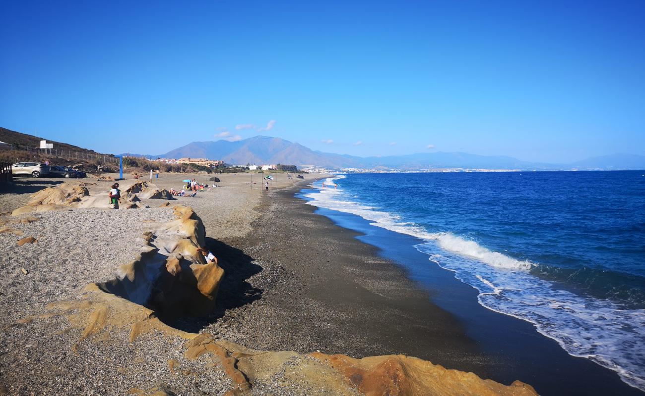 Photo de Playa Aldea avec sable gris de surface