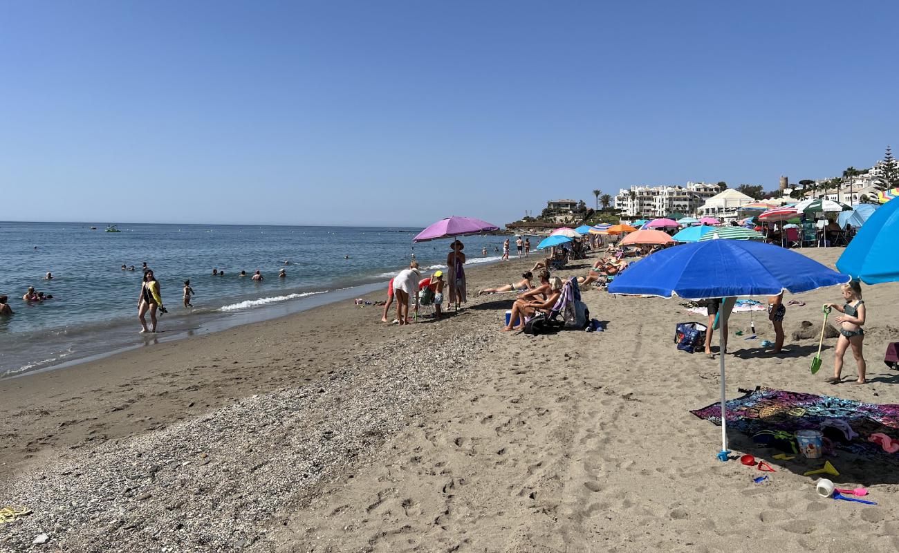 Photo de Playa El Bombo avec sable lumineux de surface
