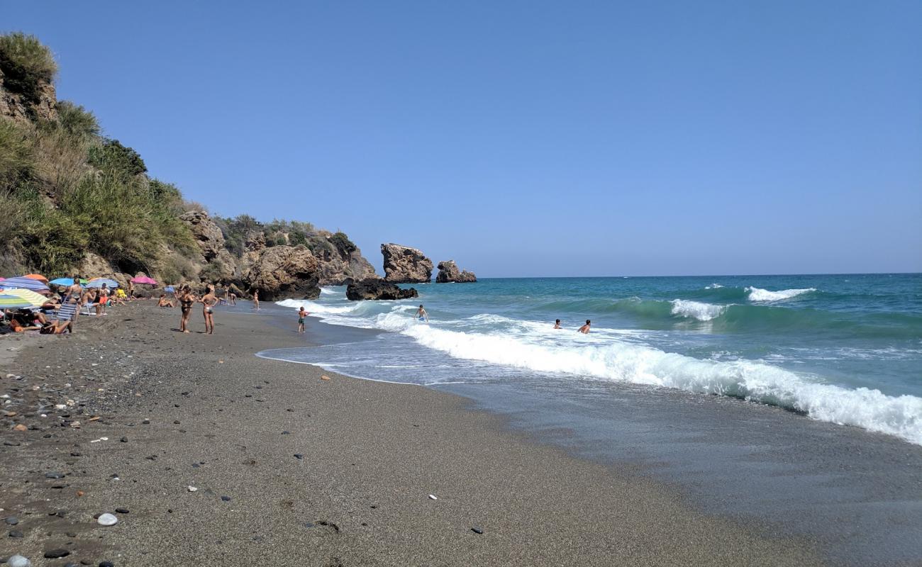 Photo de Playa de la Caleta avec sable gris & galets de surface