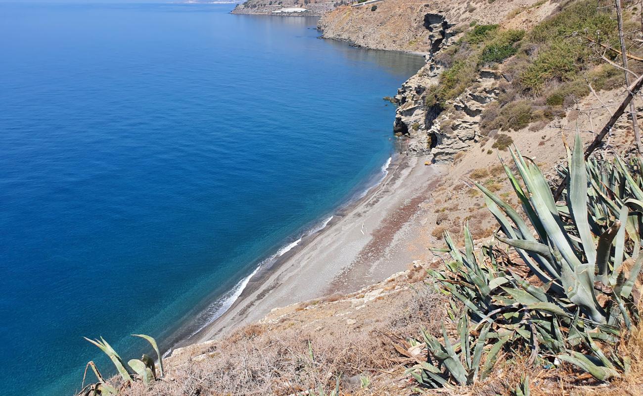Photo de Playa El Ruso avec caillou fin gris de surface