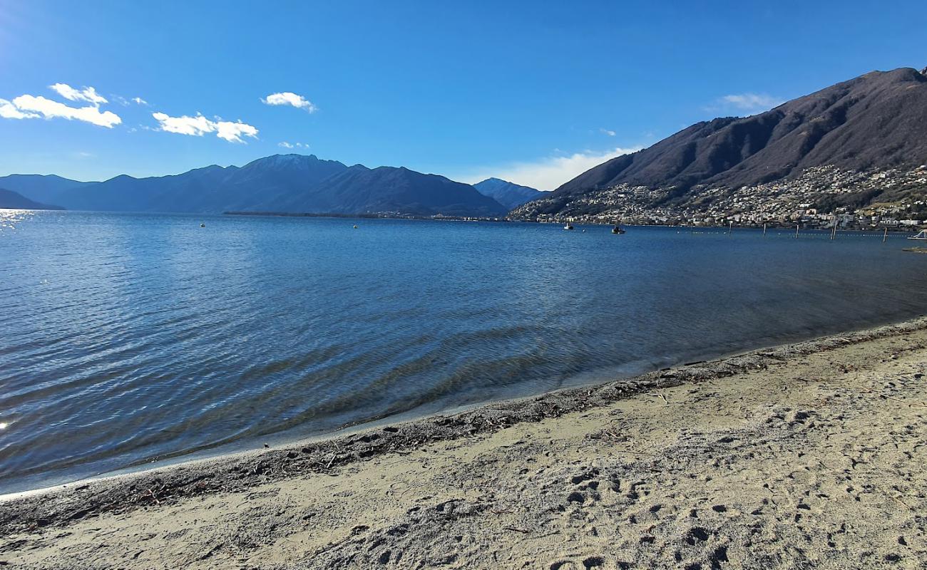 Photo de Lido di Tenero avec sable beige de surface