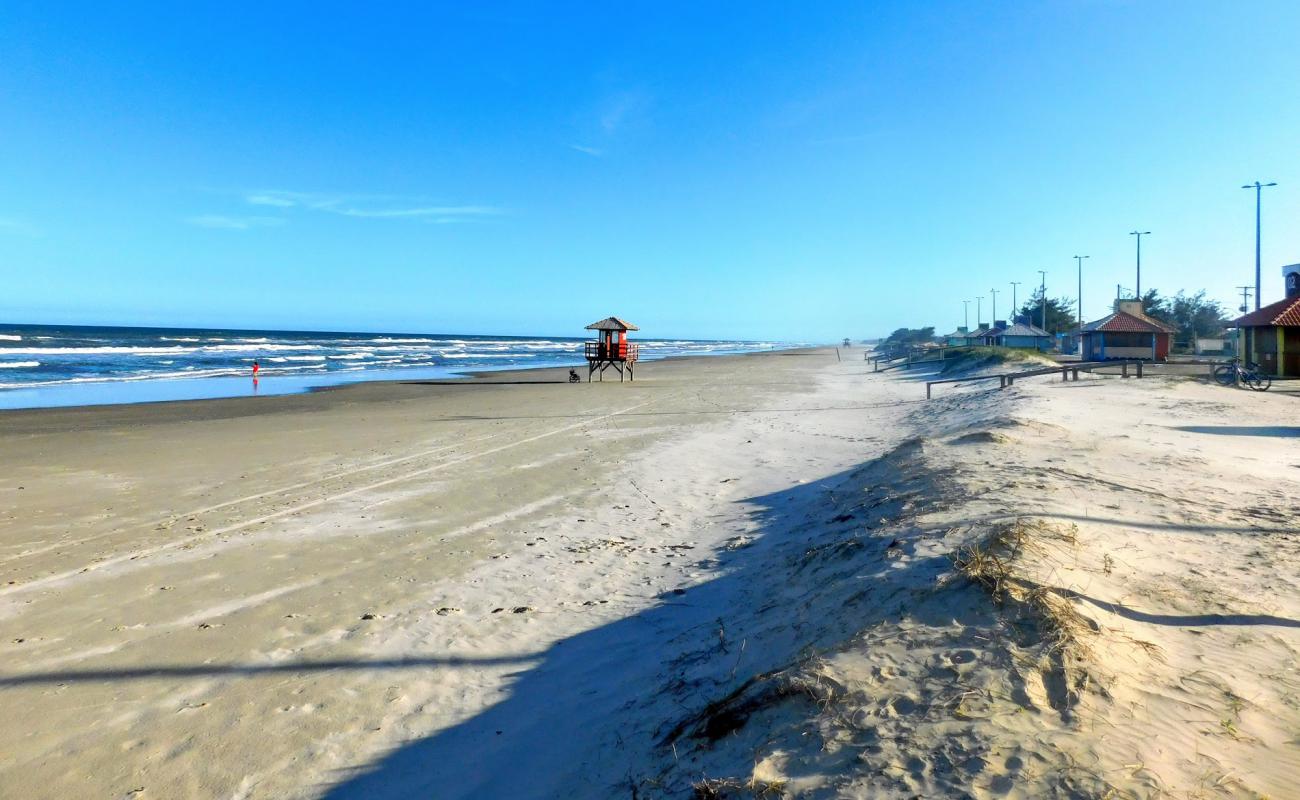 Photo de Plage d'Atlantida Sul avec sable lumineux de surface