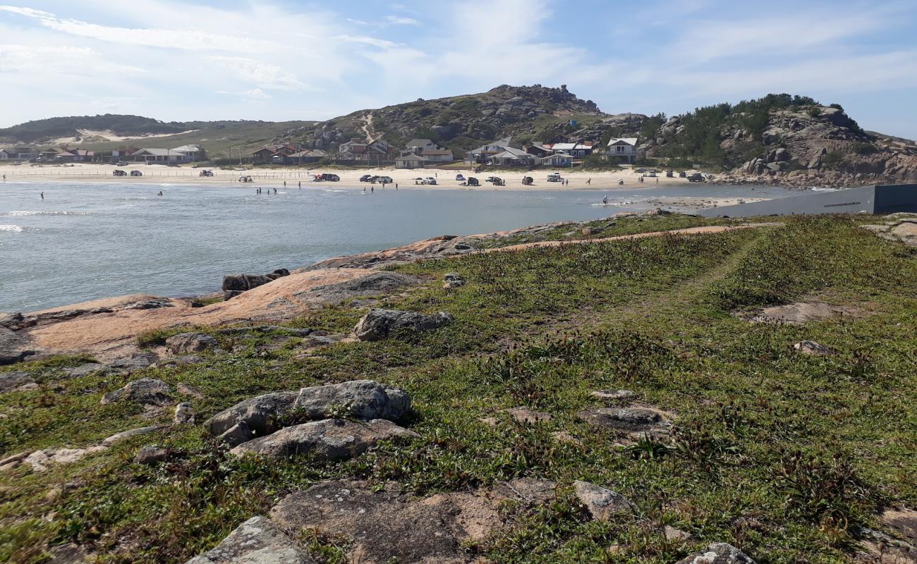 Photo de Praia de Ipua avec sable beige fin de surface