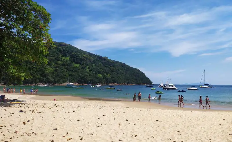 Photo de Praia das Sete Pontas avec sable fin et lumineux de surface