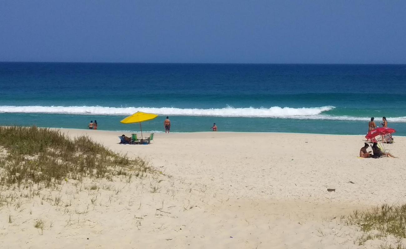 Photo de Praia do Dentinho avec sable fin blanc de surface