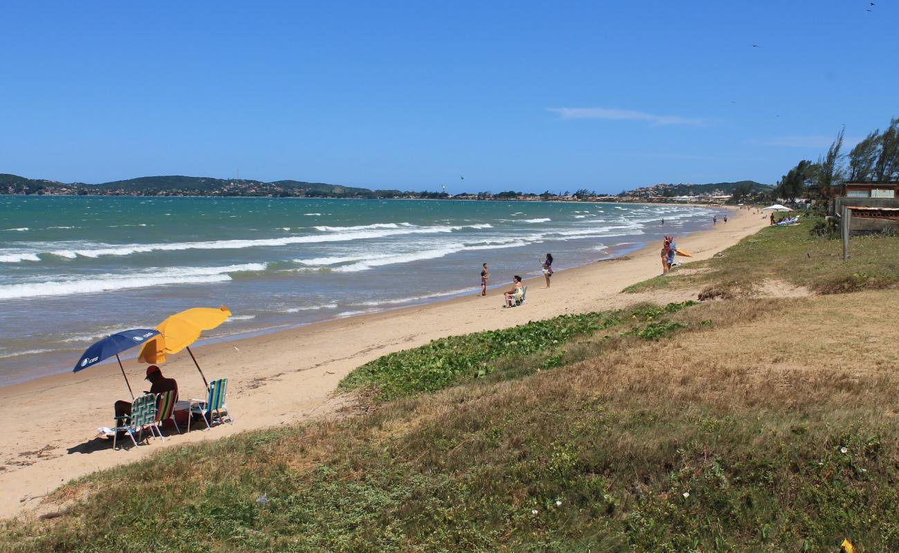 Photo de Praia da Marina avec sable lumineux de surface