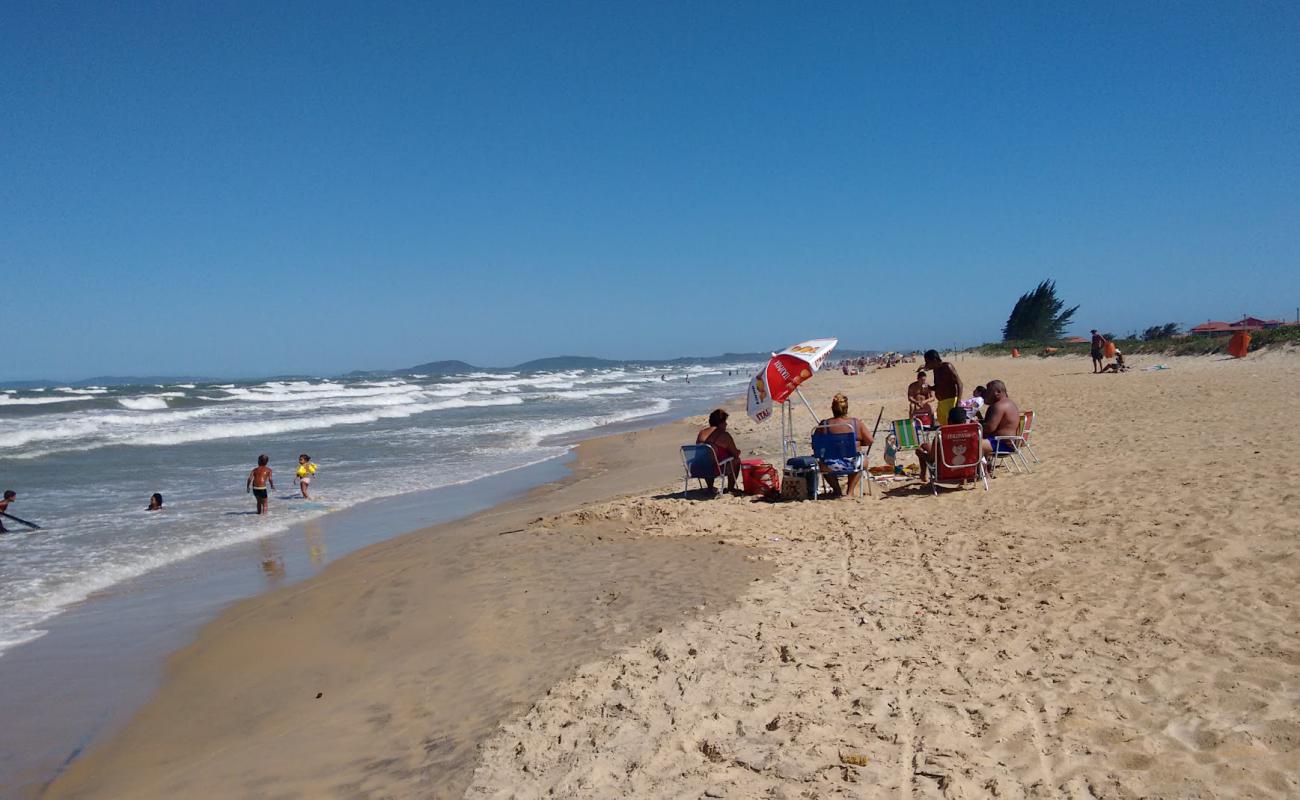 Photo de Praia do Florestinha avec sable fin et lumineux de surface