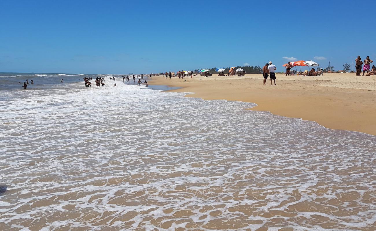 Photo de Plage de Grussai avec sable beige de surface