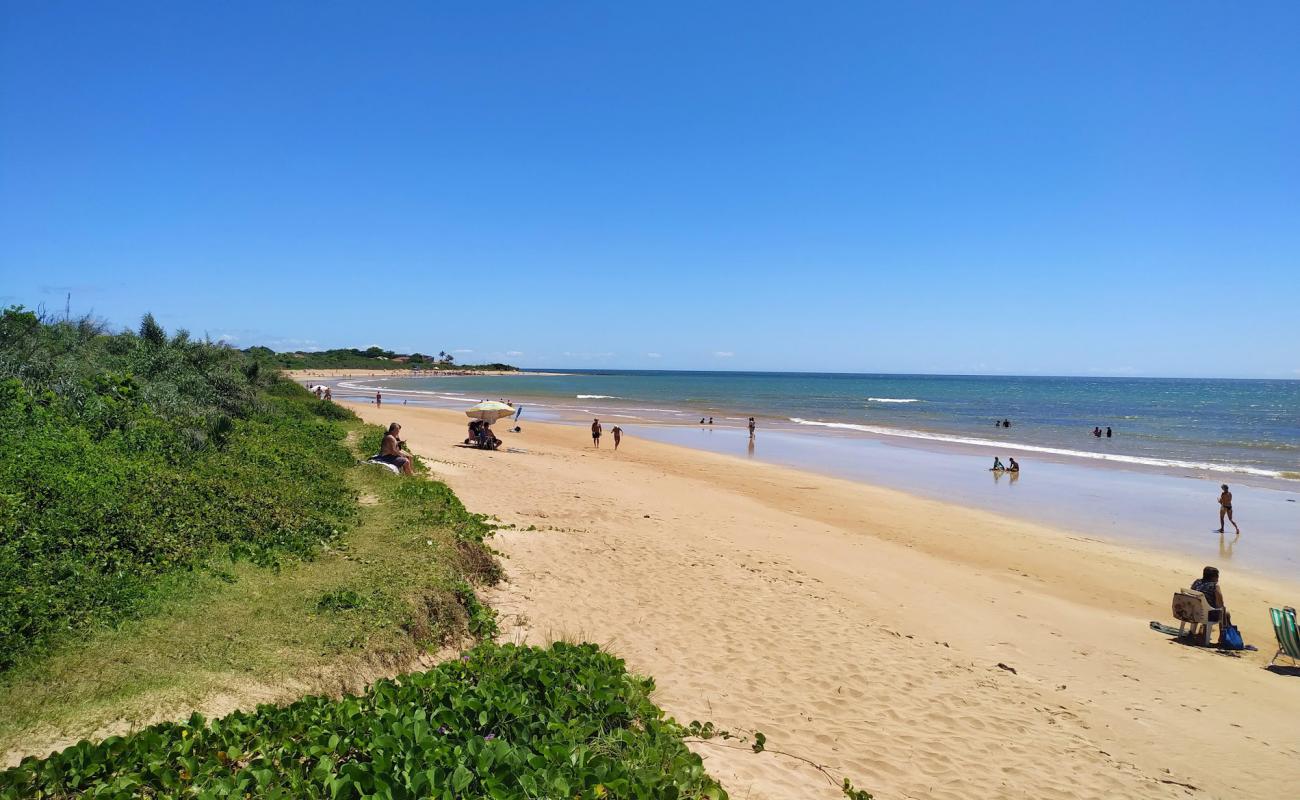 Photo de Plage de Ponta dos Fachos avec sable beige de surface