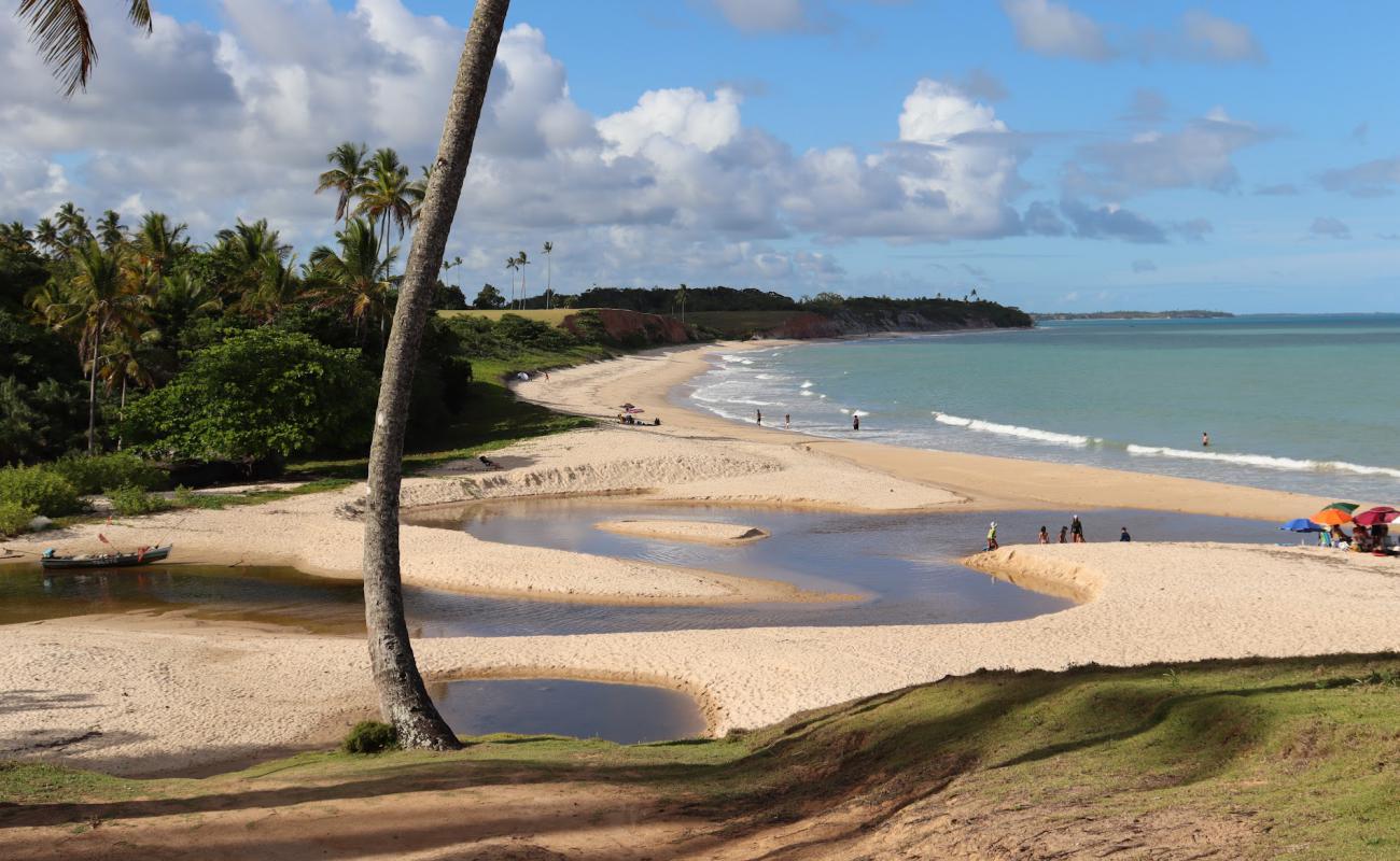 Photo de Plage d'Imbassuaba avec sable beige fin de surface