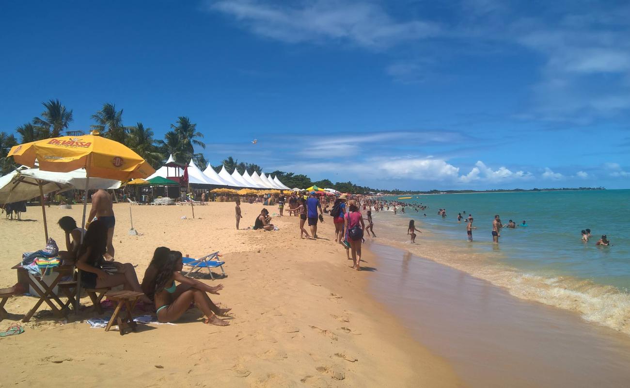 Photo de Plage de Taperapua avec sable beige fin de surface