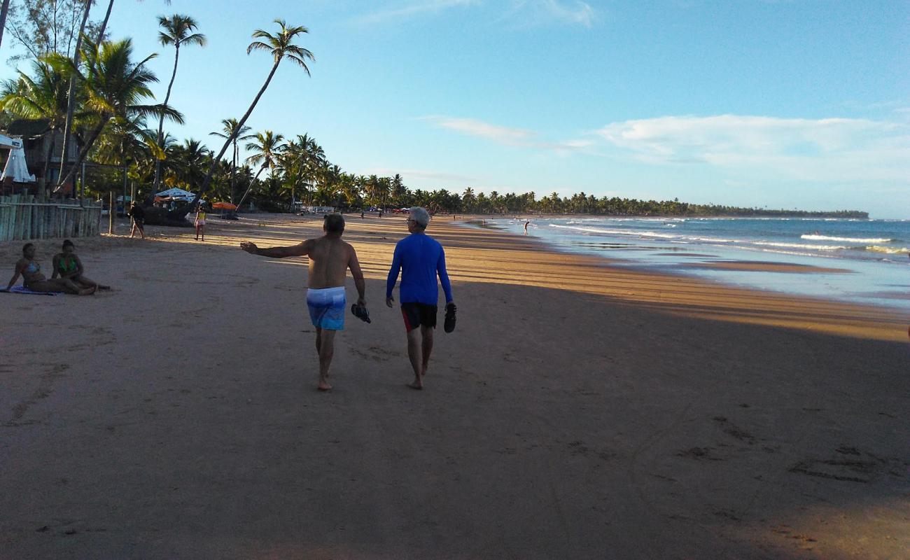 Photo de Praia do Cassange avec sable lumineux de surface