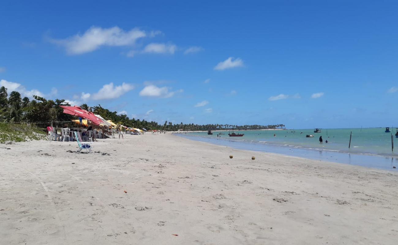 Photo de Praia de Cacha Pregos avec sable lumineux de surface