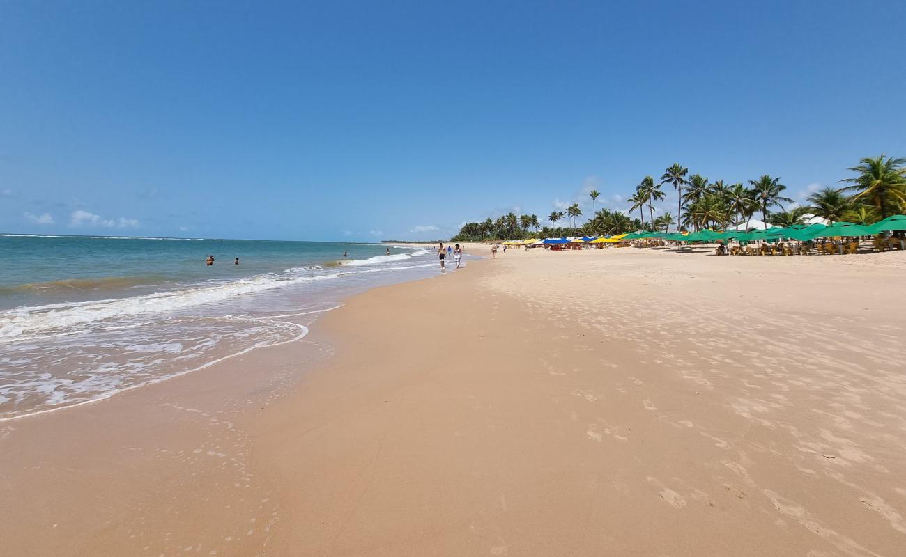 Photo de Plage de Guarajuba avec sable lumineux de surface