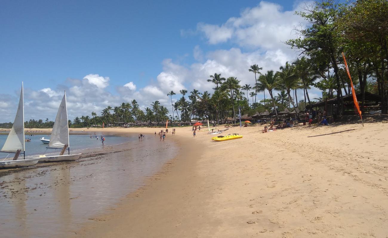 Photo de Praia do Tivoli avec sable lumineux de surface