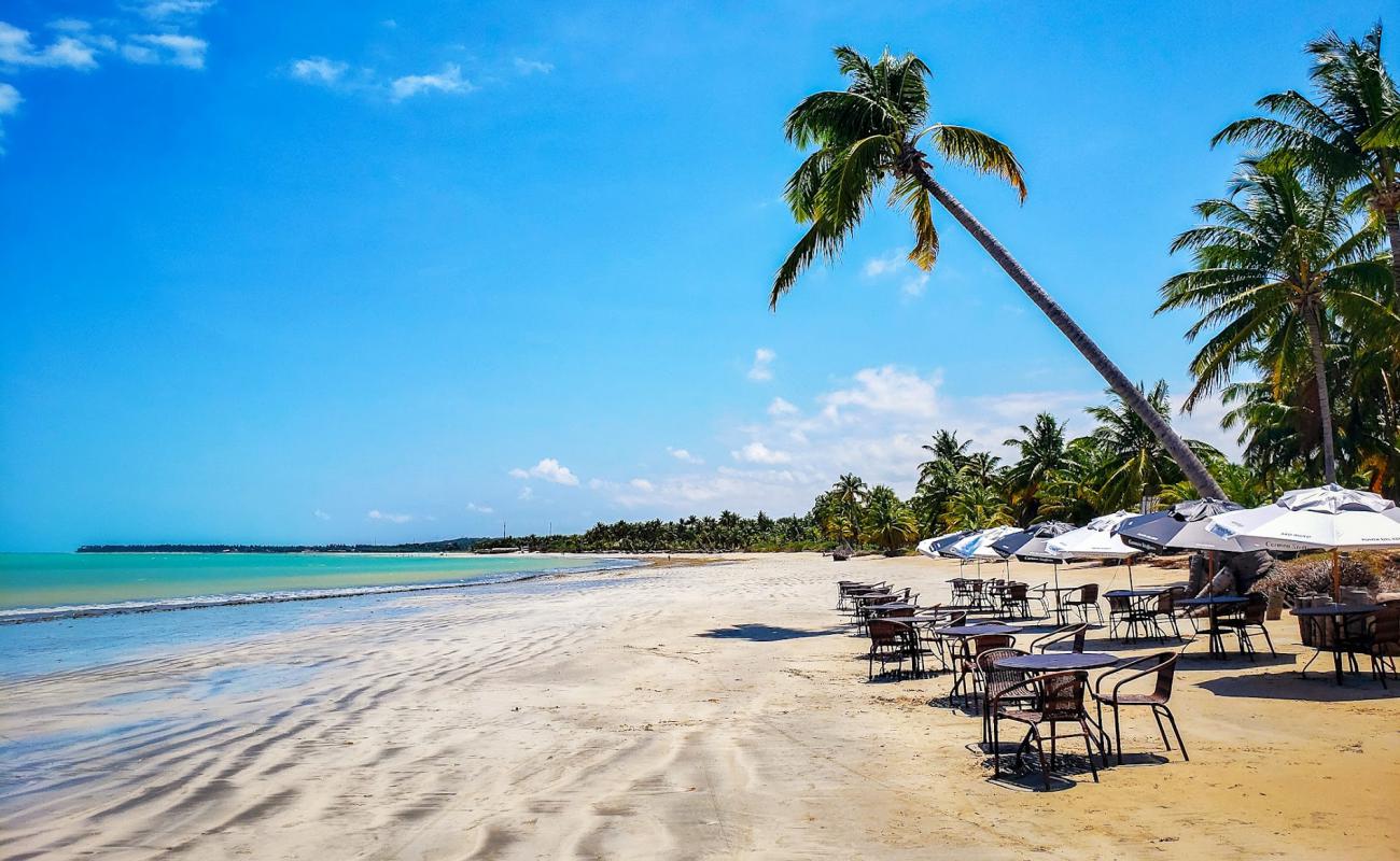 Photo de Praia de Sauacui avec sable lumineux de surface