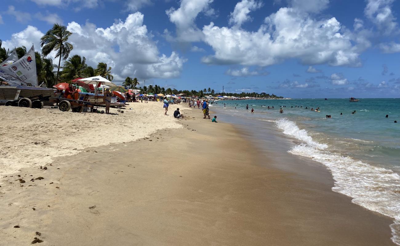 Photo de Praia de Tamandare avec sable fin et lumineux de surface