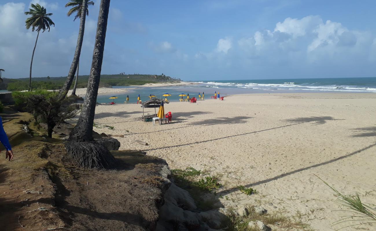 Photo de Plage de Barra do Grau avec sable fin et lumineux de surface