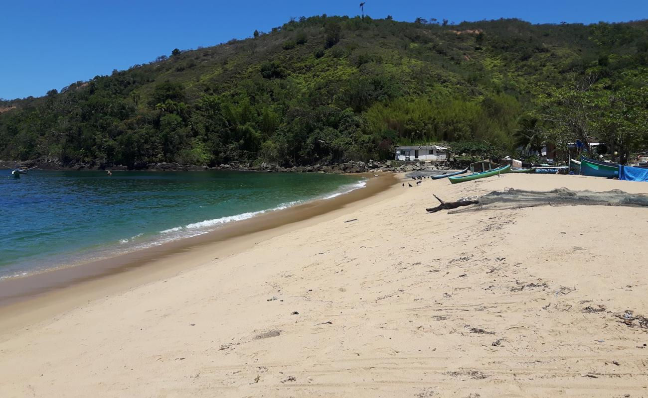 Photo de Praia da Serraria avec sable beige de surface