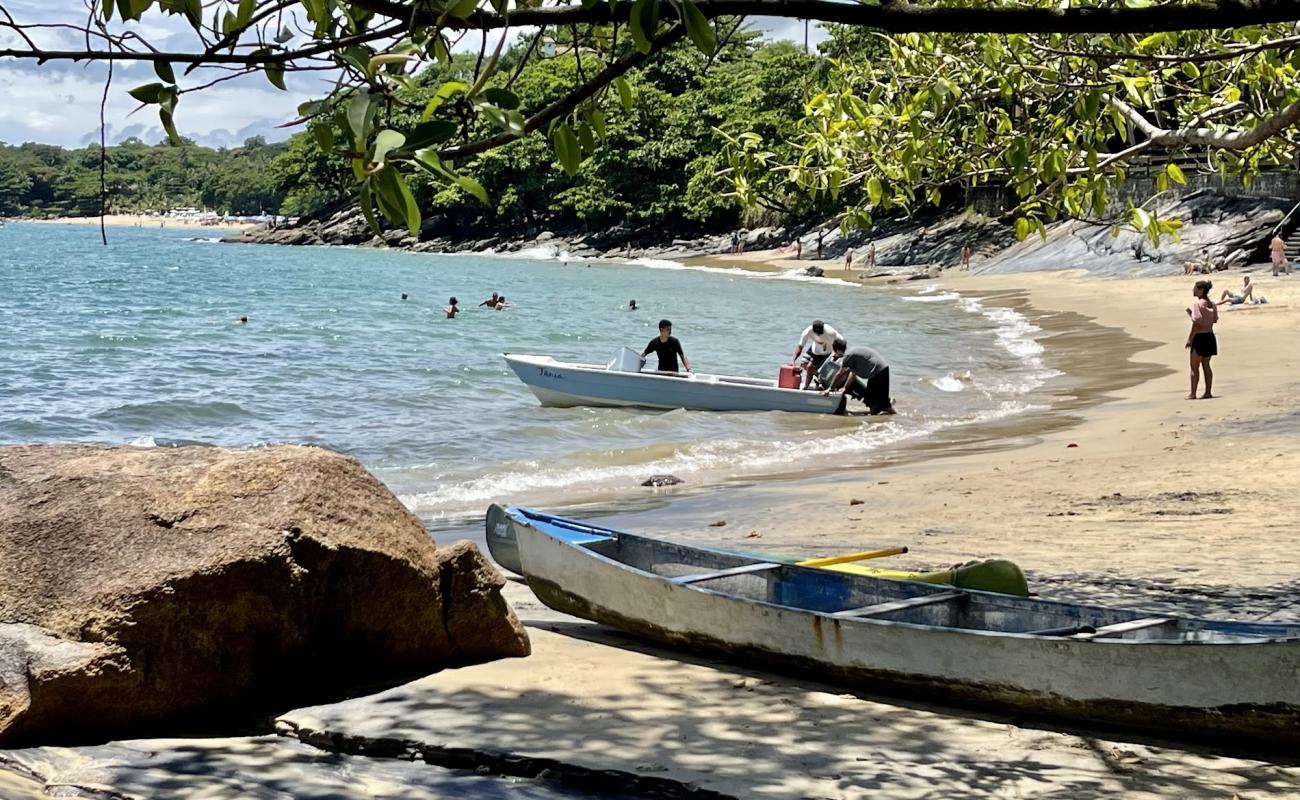 Photo de Praia do Veloso avec sable beige de surface
