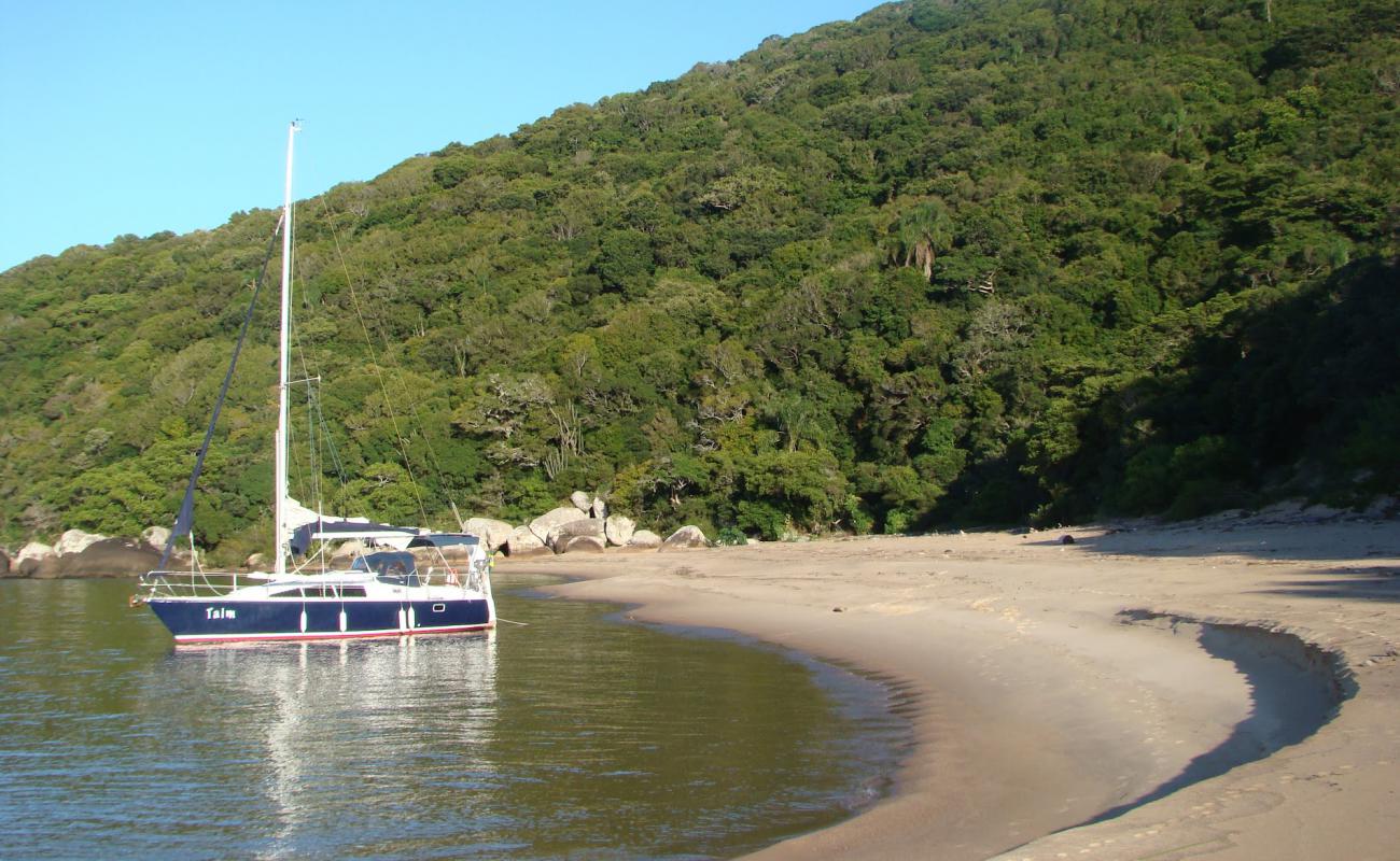 Photo de Praia do Tigre avec sable beige de surface