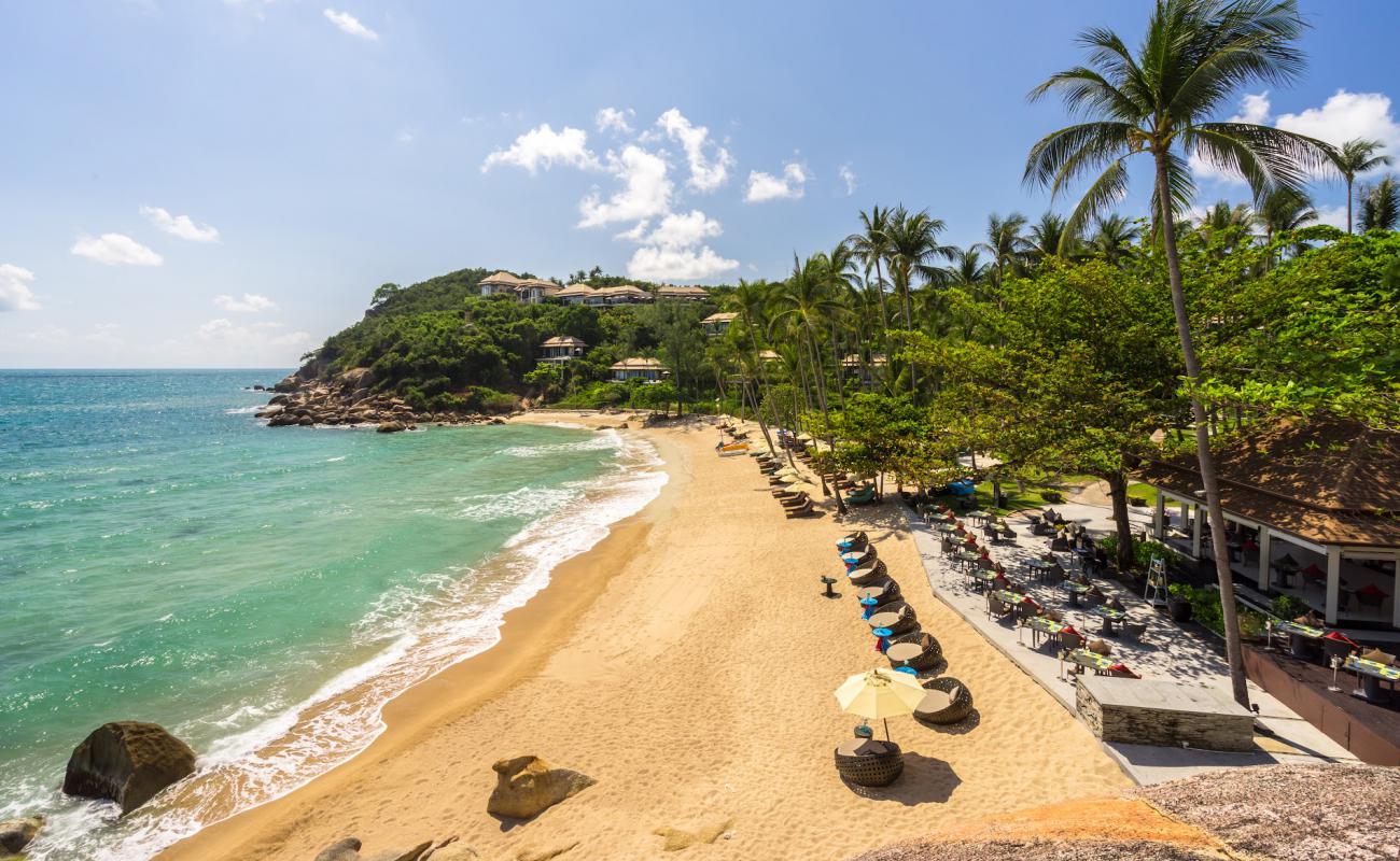 Photo de Coral Bay Beach avec sable beige de surface