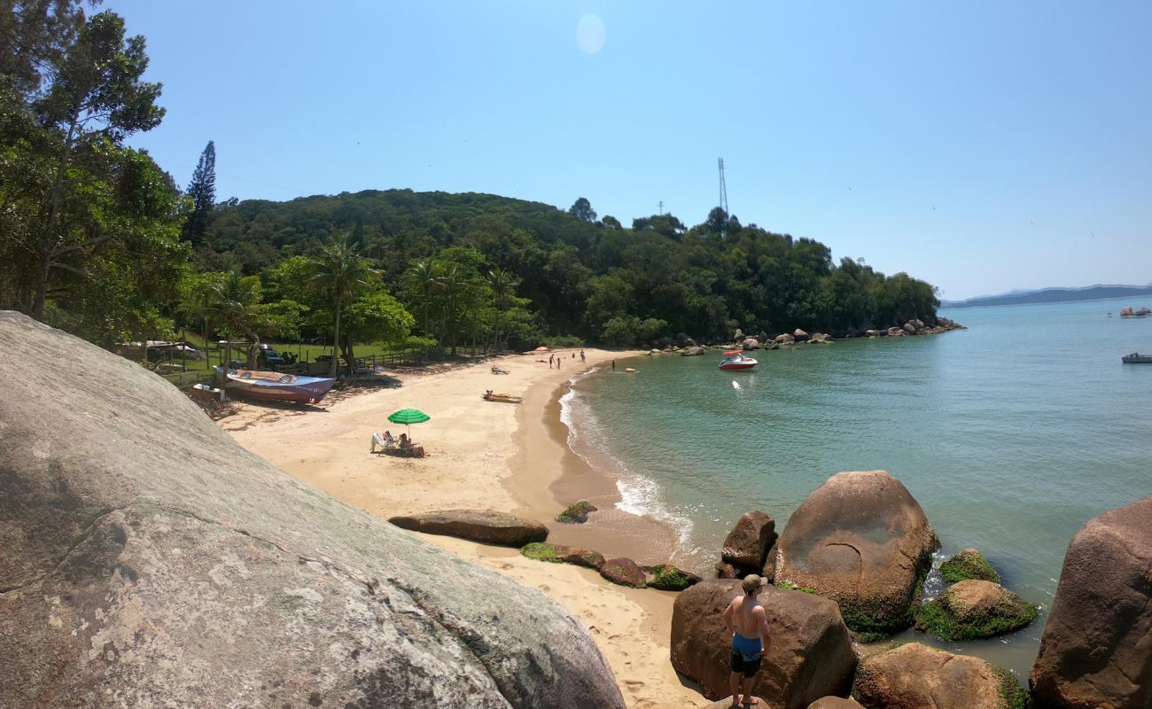 Photo de Praia Recanto avec sable beige de surface