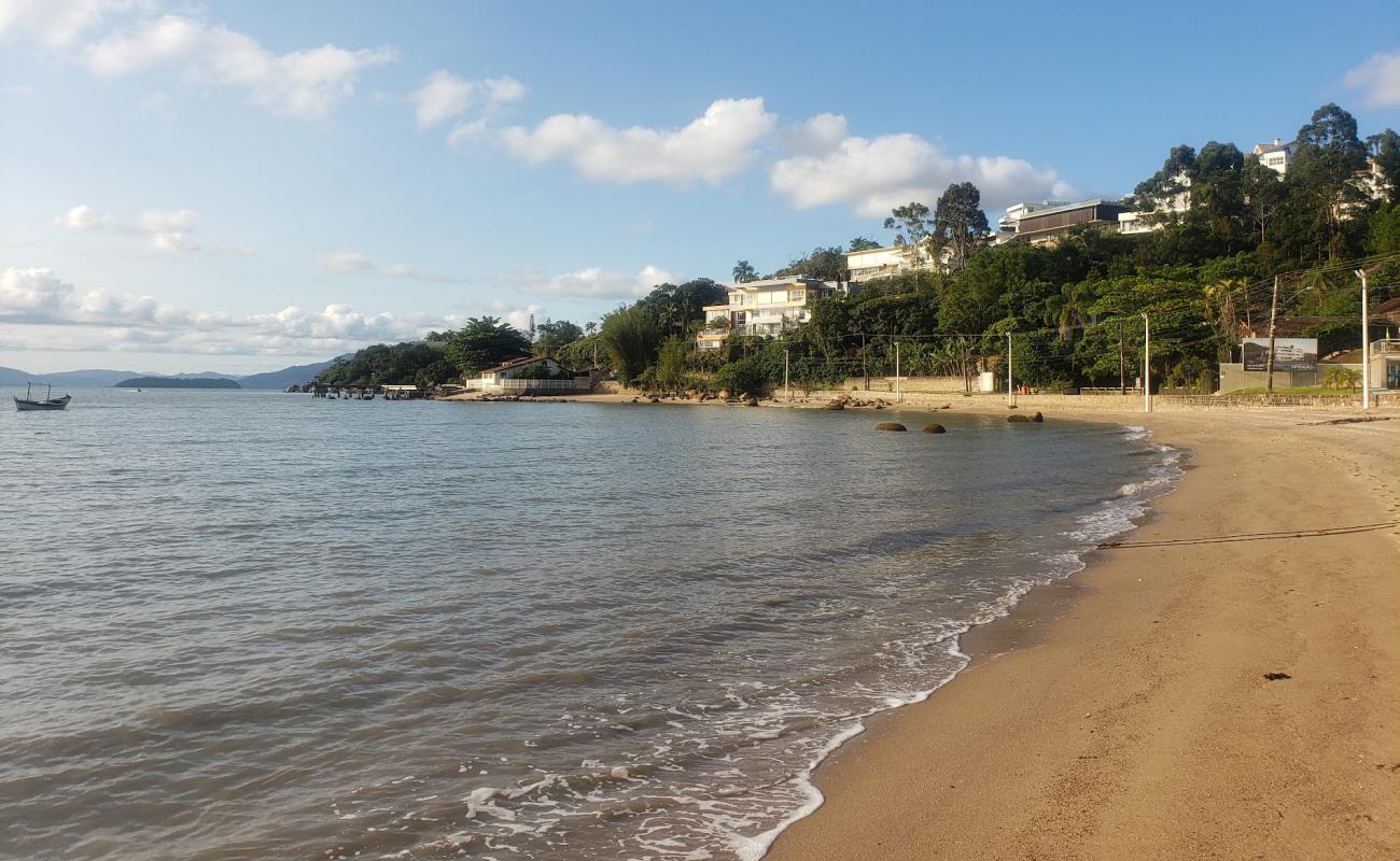 Photo de Praia Do Cacupe avec sable beige de surface