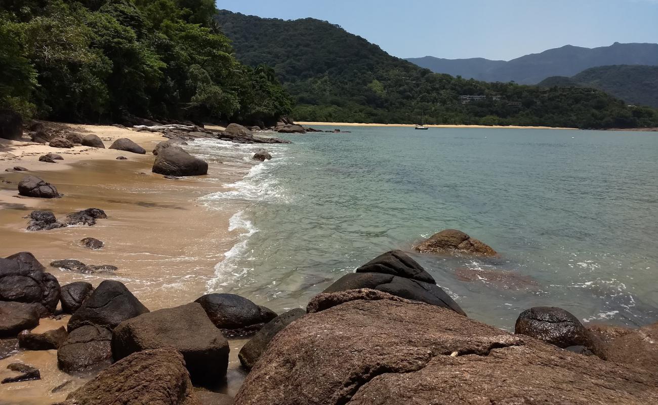 Photo de Moco Beach avec sable beige de surface