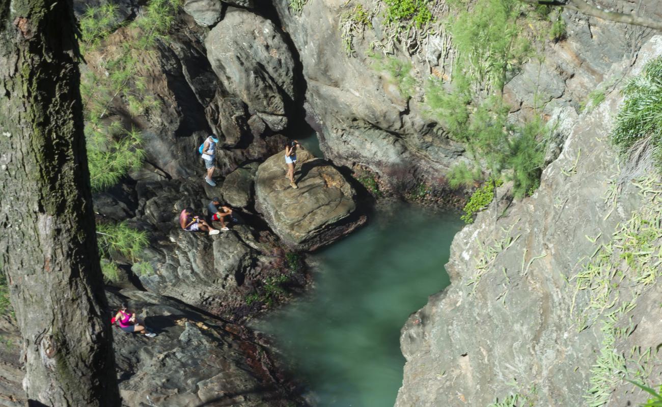 Photo de Gruta de Ponta Negra avec terrain rocheux de surface
