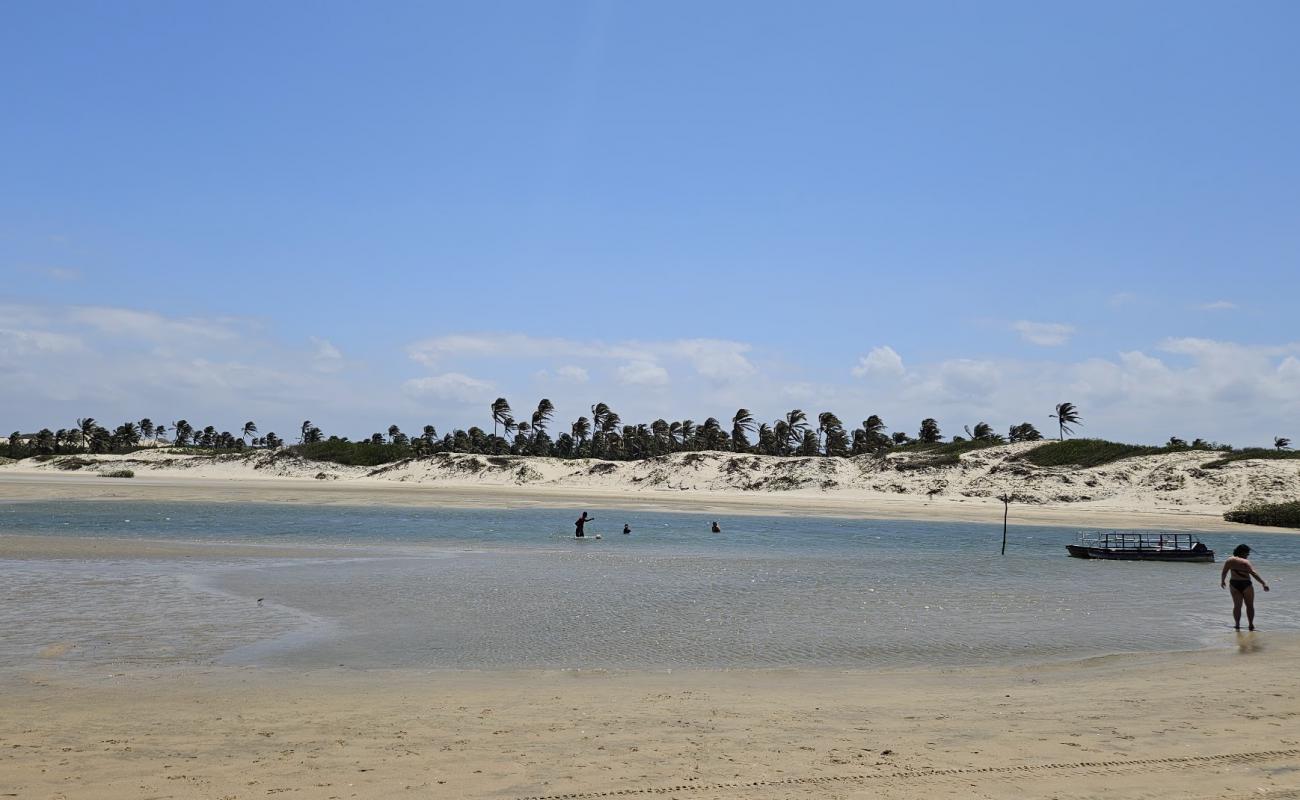 Photo de Praia do Rio Trairi avec sable beige de surface