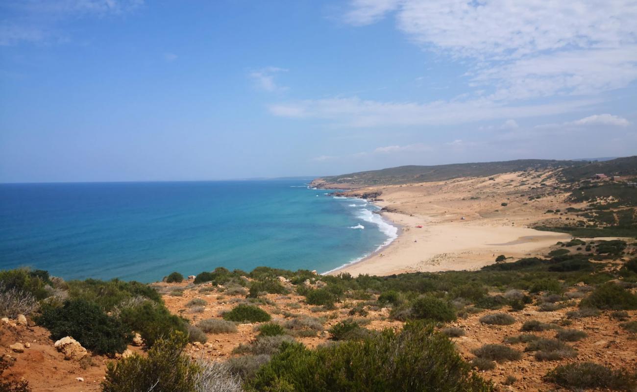 Photo de Plage Mangaa avec sable fin et lumineux de surface