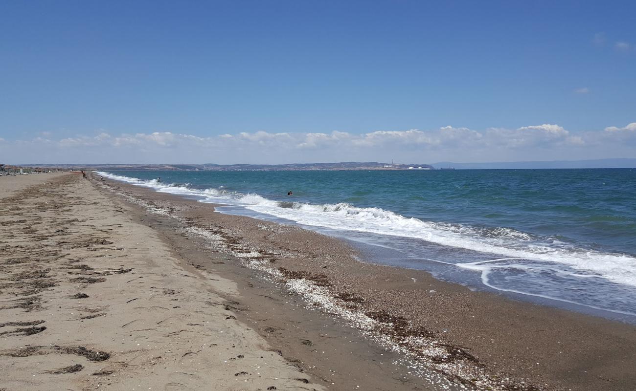 Photo de Vast City beach avec caillou fin clair de surface