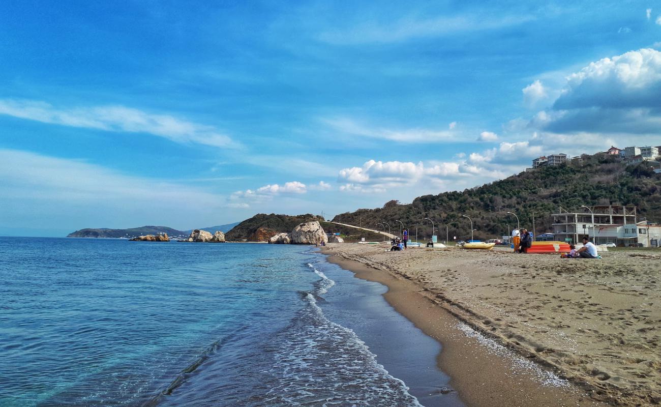 Photo de Egerce beach avec sable beige de surface