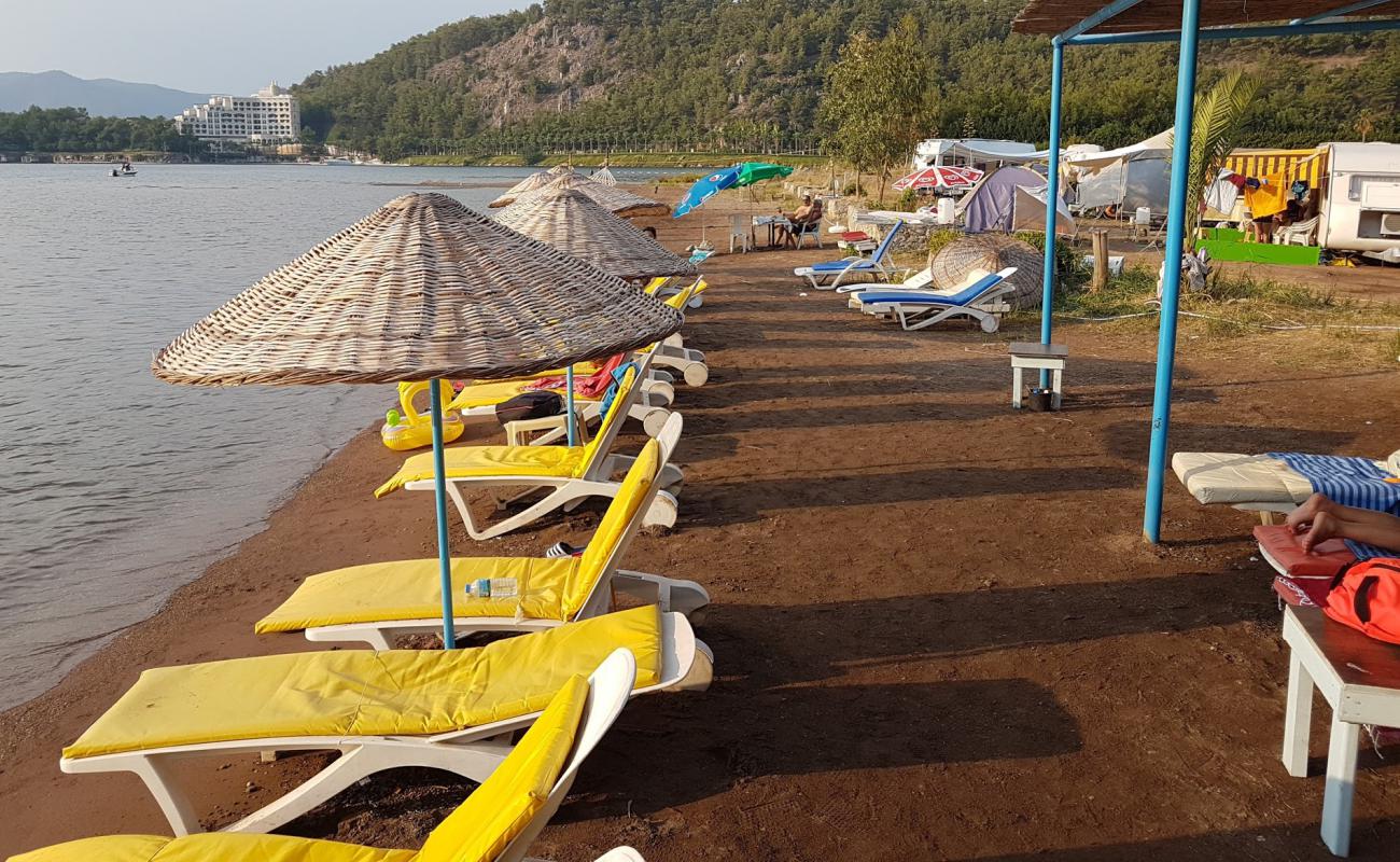 Photo de Turgut beach avec sable brun de surface
