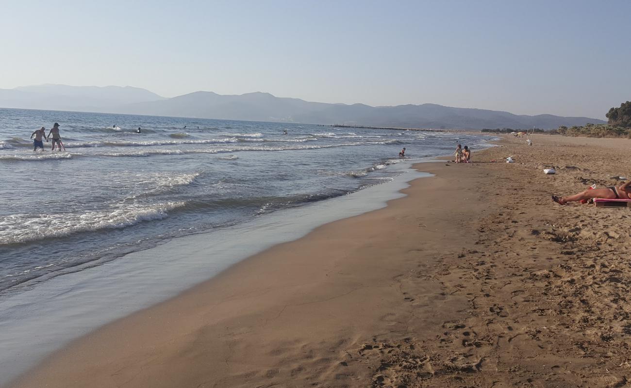 Photo de Pamucak beach II avec sable brun de surface