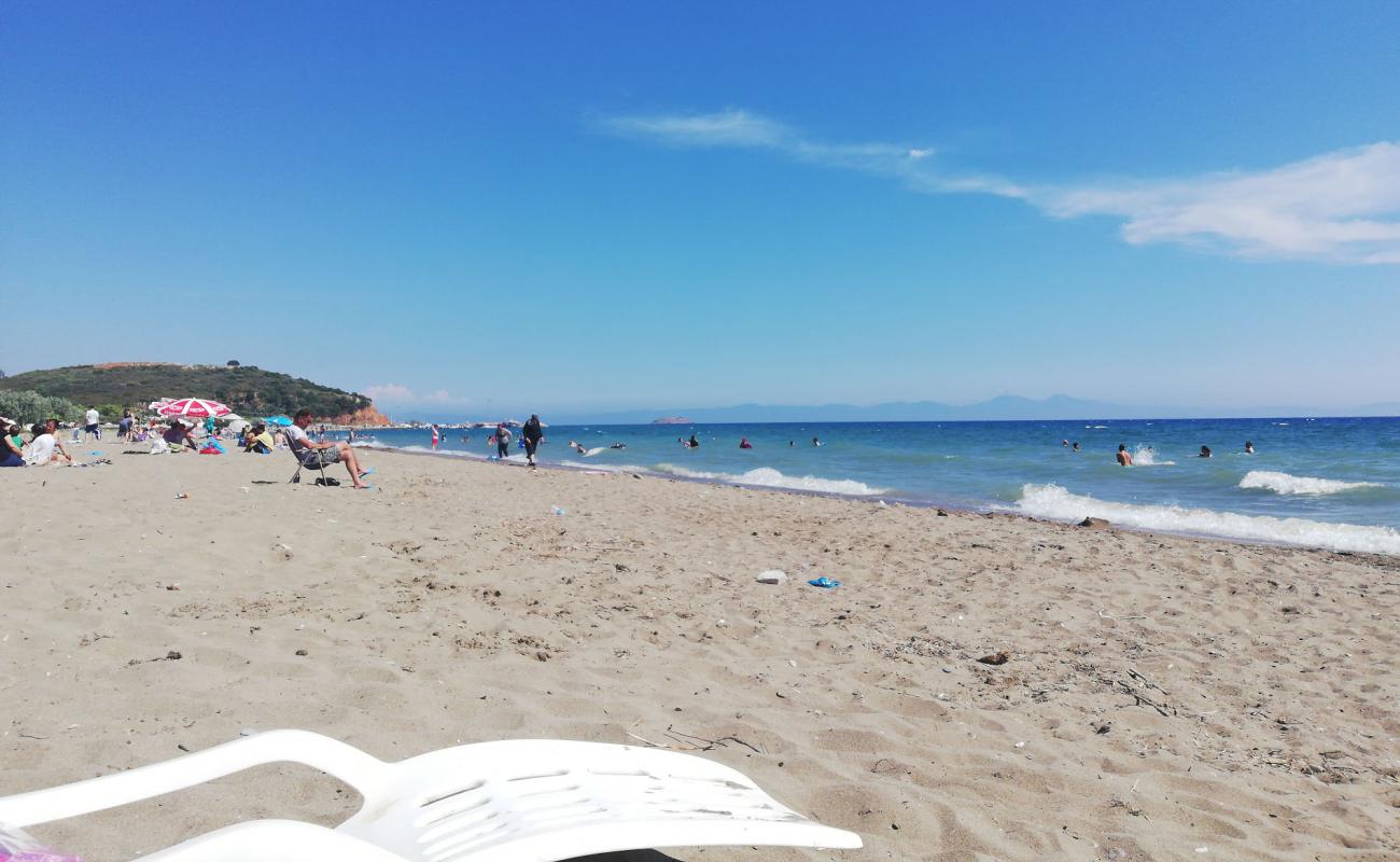Photo de Gumuldur beach avec sable beige de surface