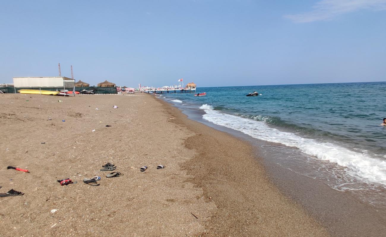 Photo de Lara Public beach avec sable brun de surface