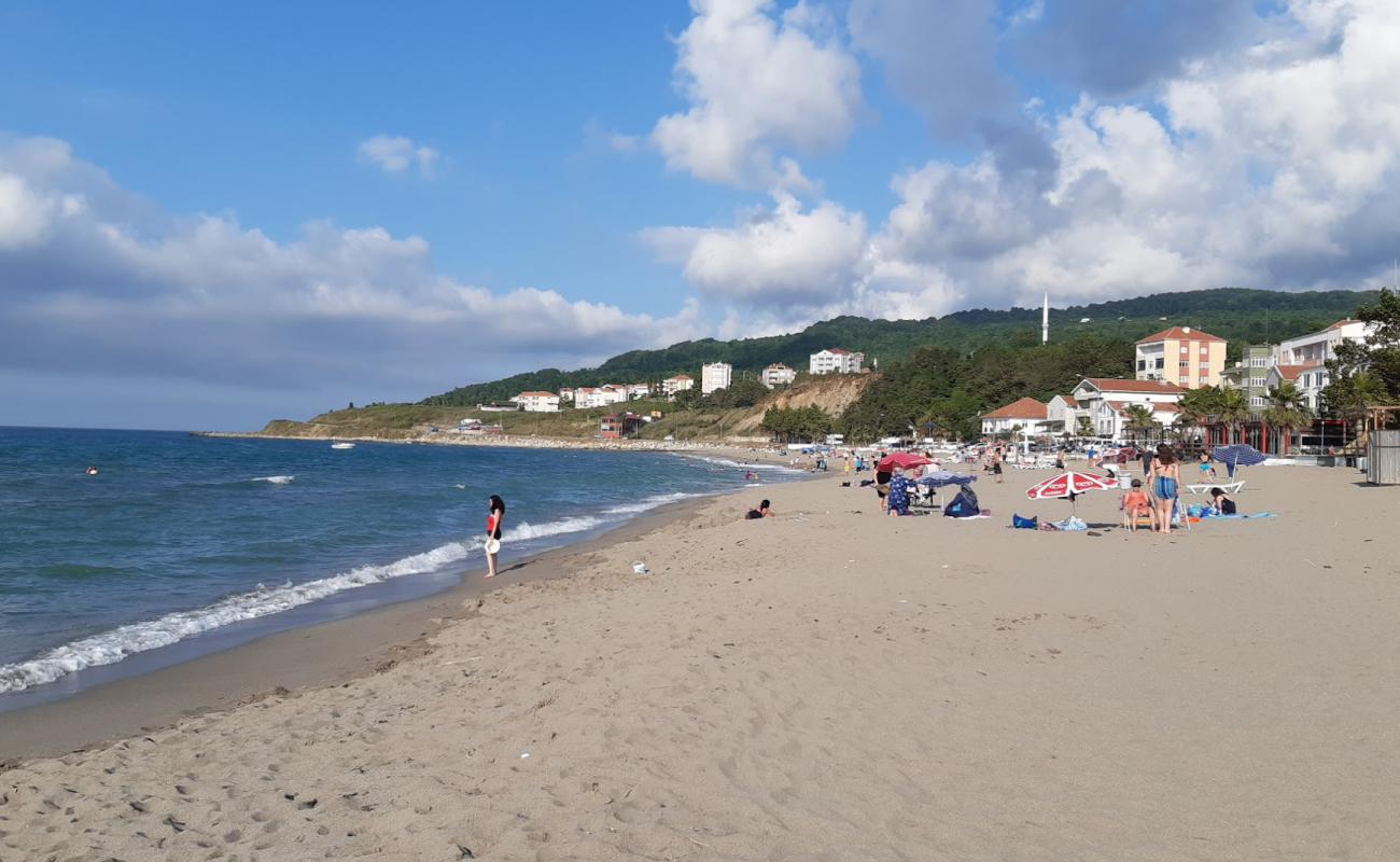 Photo de Guzelkent Halk Plaji avec sable beige de surface