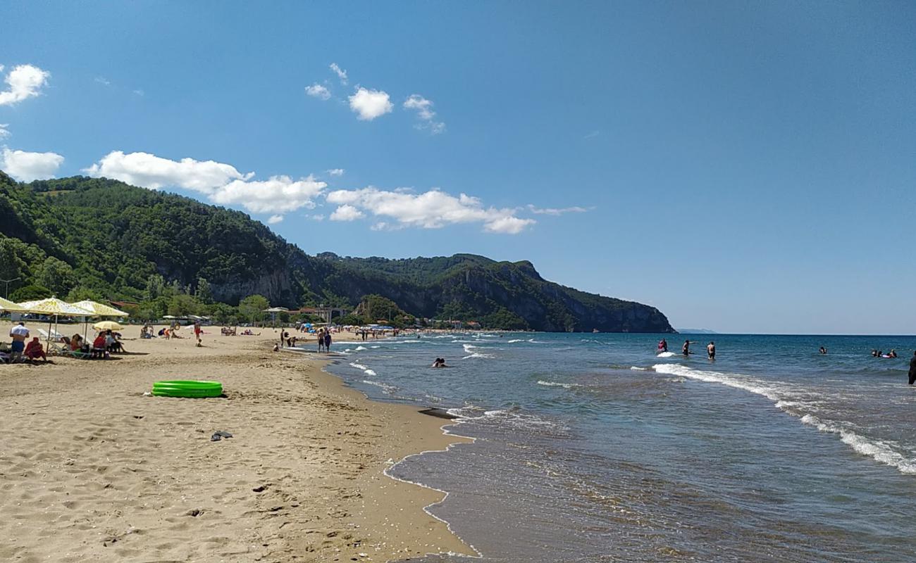 Photo de Plage d'Inkumu avec sable beige de surface