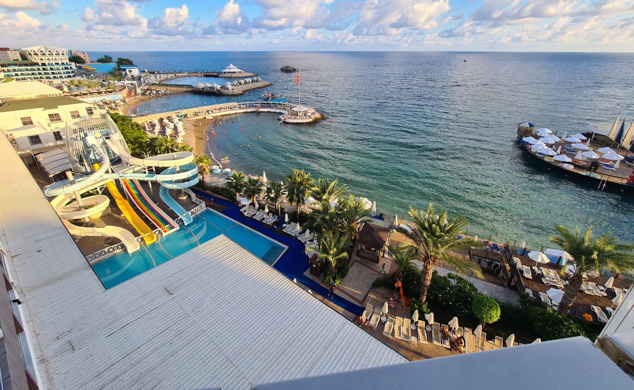 Photo de Orange County Alanya Beach avec sable beige de surface