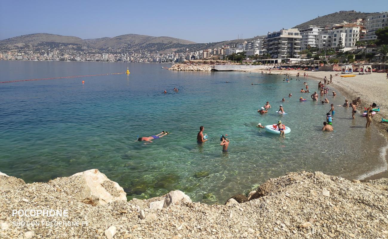 Photo de Plage de Mango avec caillou fin clair de surface