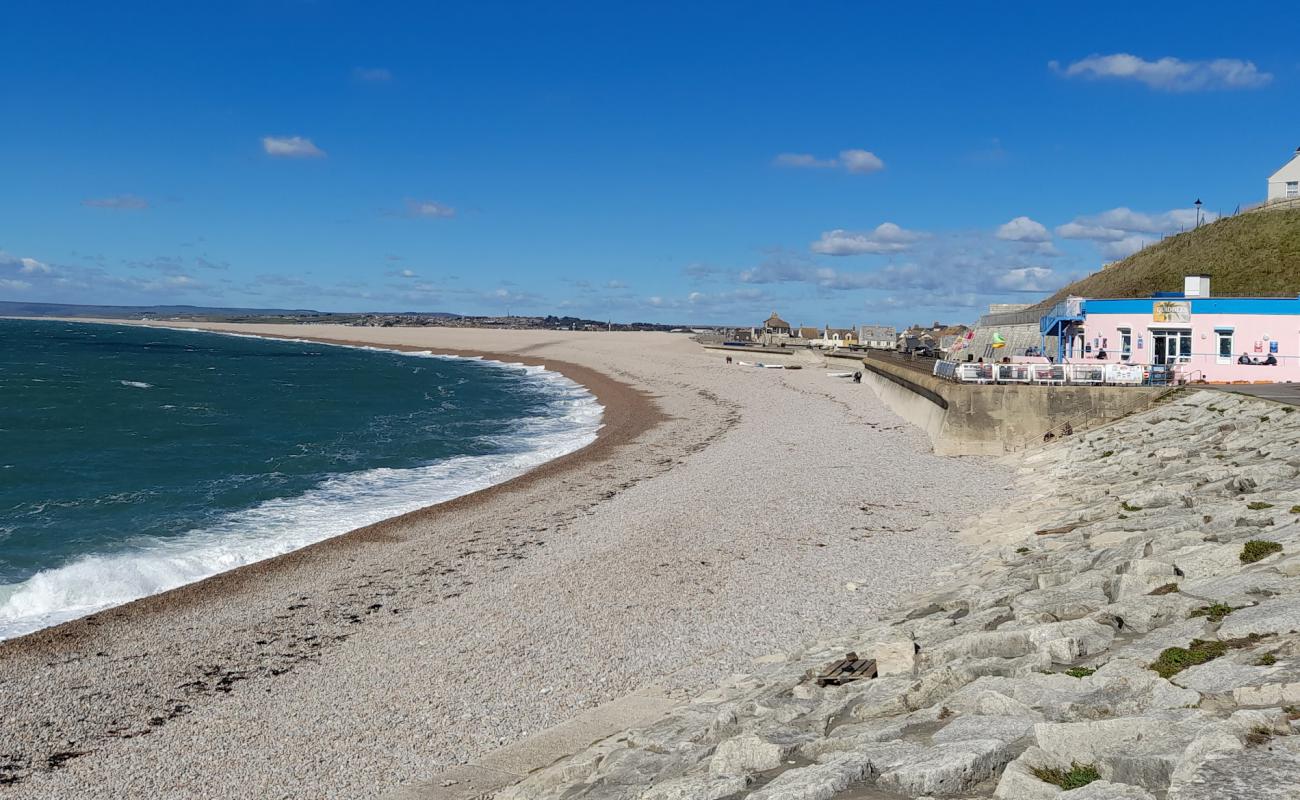 Photo de Chiswell beach avec galets beige de surface