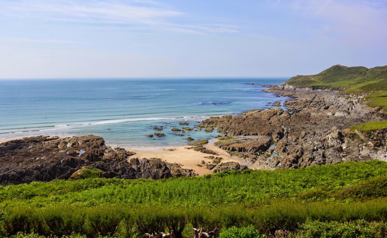 Photo de Grunta beach avec sable lumineux de surface