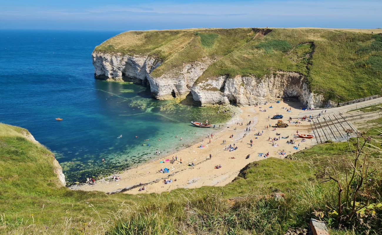 Photo de North Landing beach avec sable beige & galets de surface