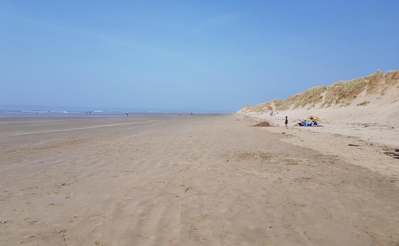 Photo de Morfa Dyffryn beach avec galets gris de surface