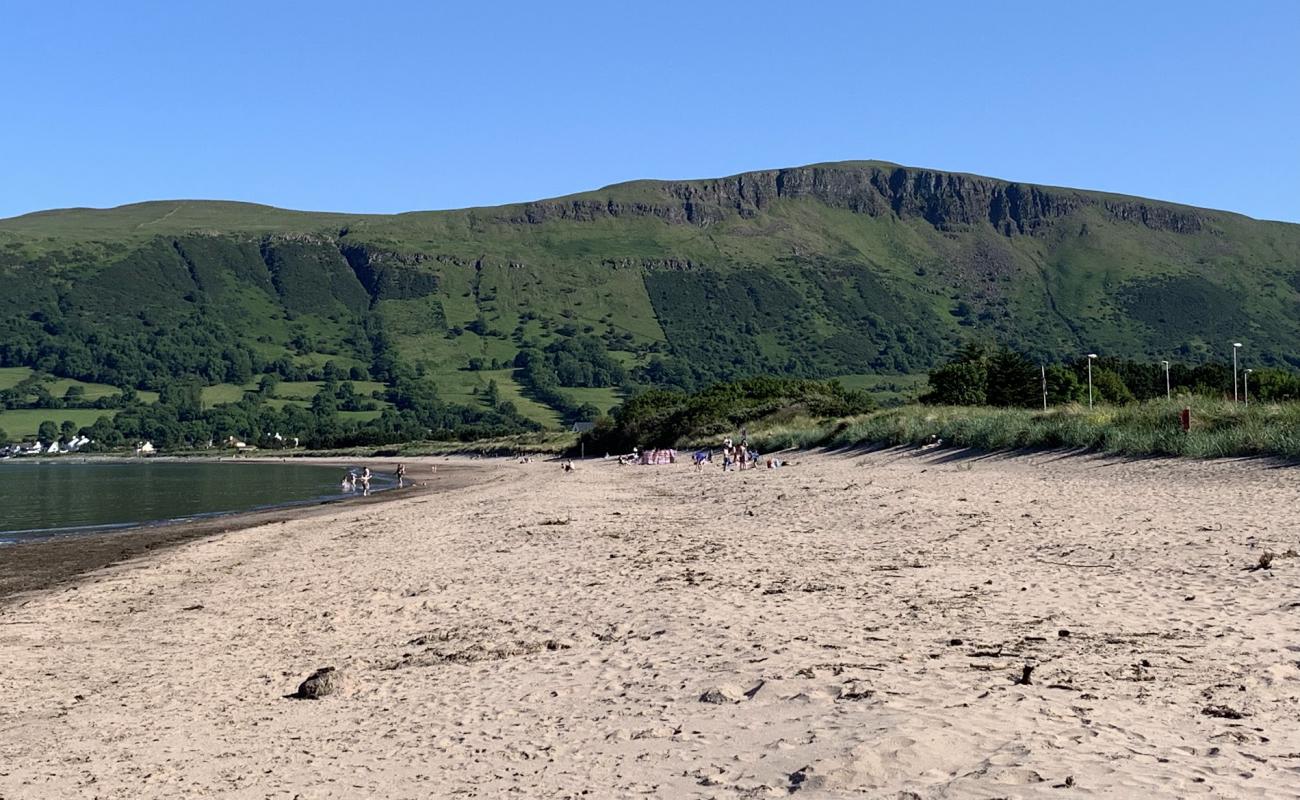 Photo de Waterfoot Beach avec sable brun de surface