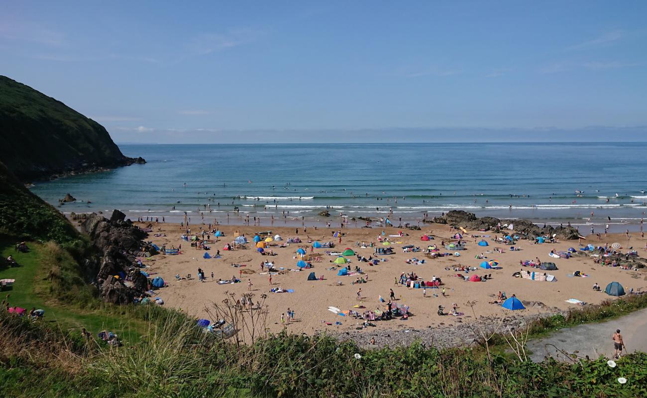 Photo de Putsborough beach avec sable lumineux de surface