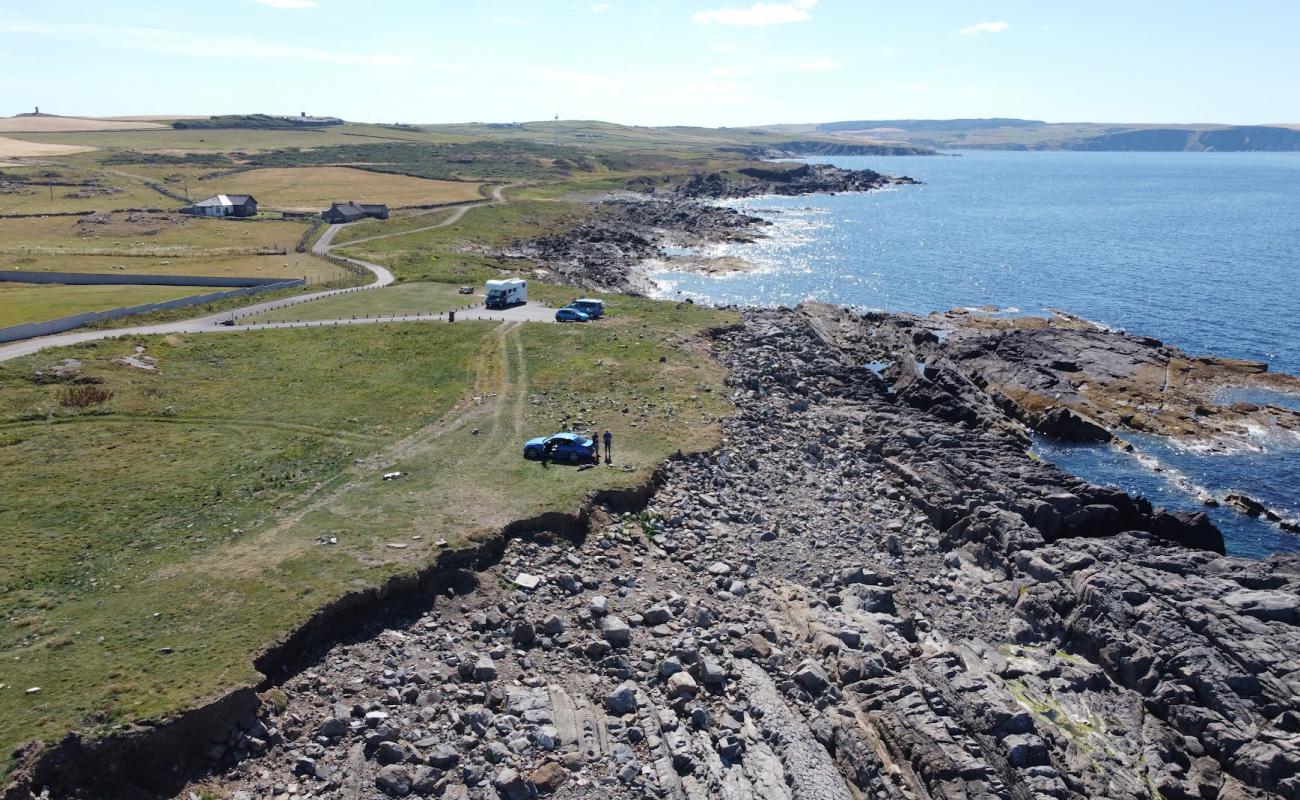 Photo de Stony Beach, Rosehearty avec roches de surface