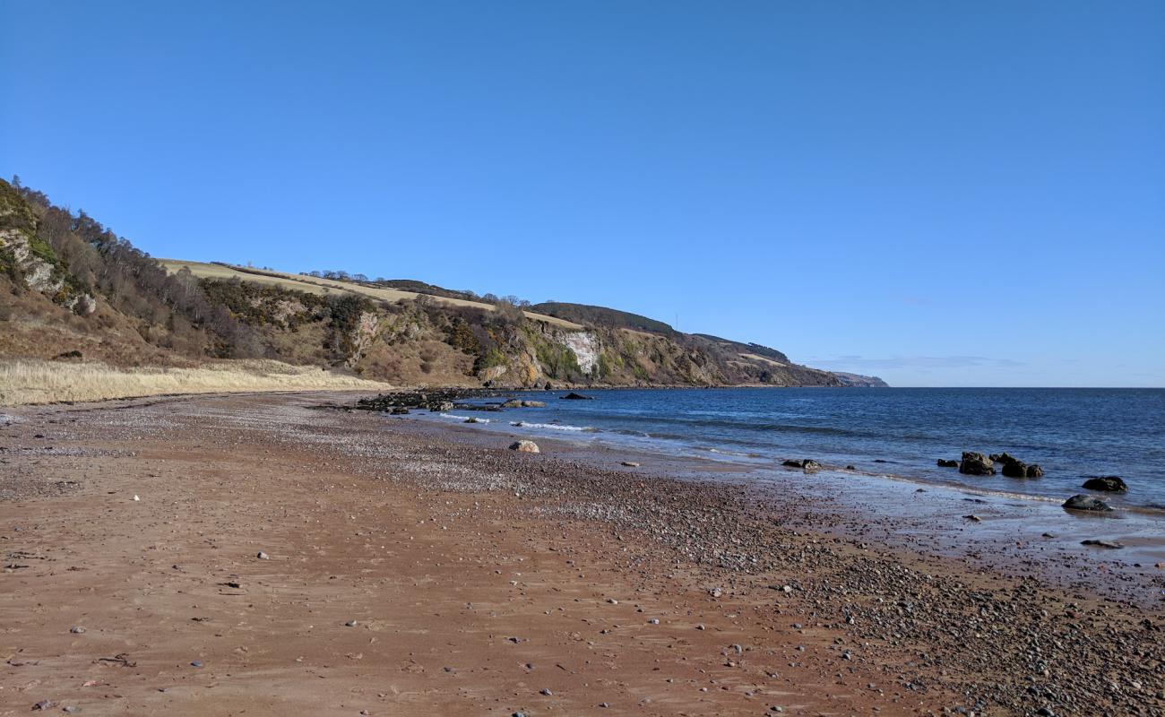 Photo de Rosemarkie Beach Caves avec sable beige & pierres de surface